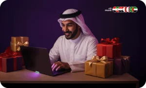 Arab man smiling while shopping online using laptop surrounded by colorful gift boxes representing popular gift cards in MENA region