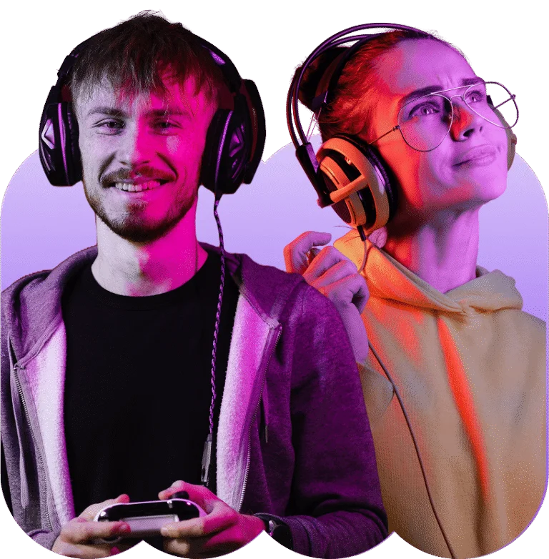 Two happy gamers wearing headphones enjoying gaming experience with colorful neon lighting.