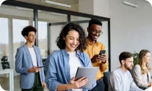 Business professionals using digital devices to manage and distribute digital gift cards through an integrated platform.